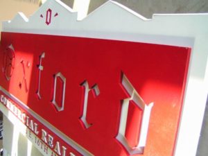 Custom real estate wooden and painted sign