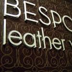 laser etched leather sign w raised acrylic lettering