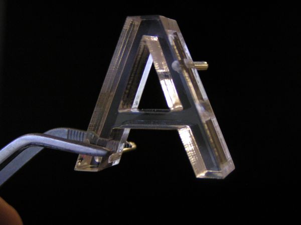 small laser cut letter w pins small laser cut letter w pins